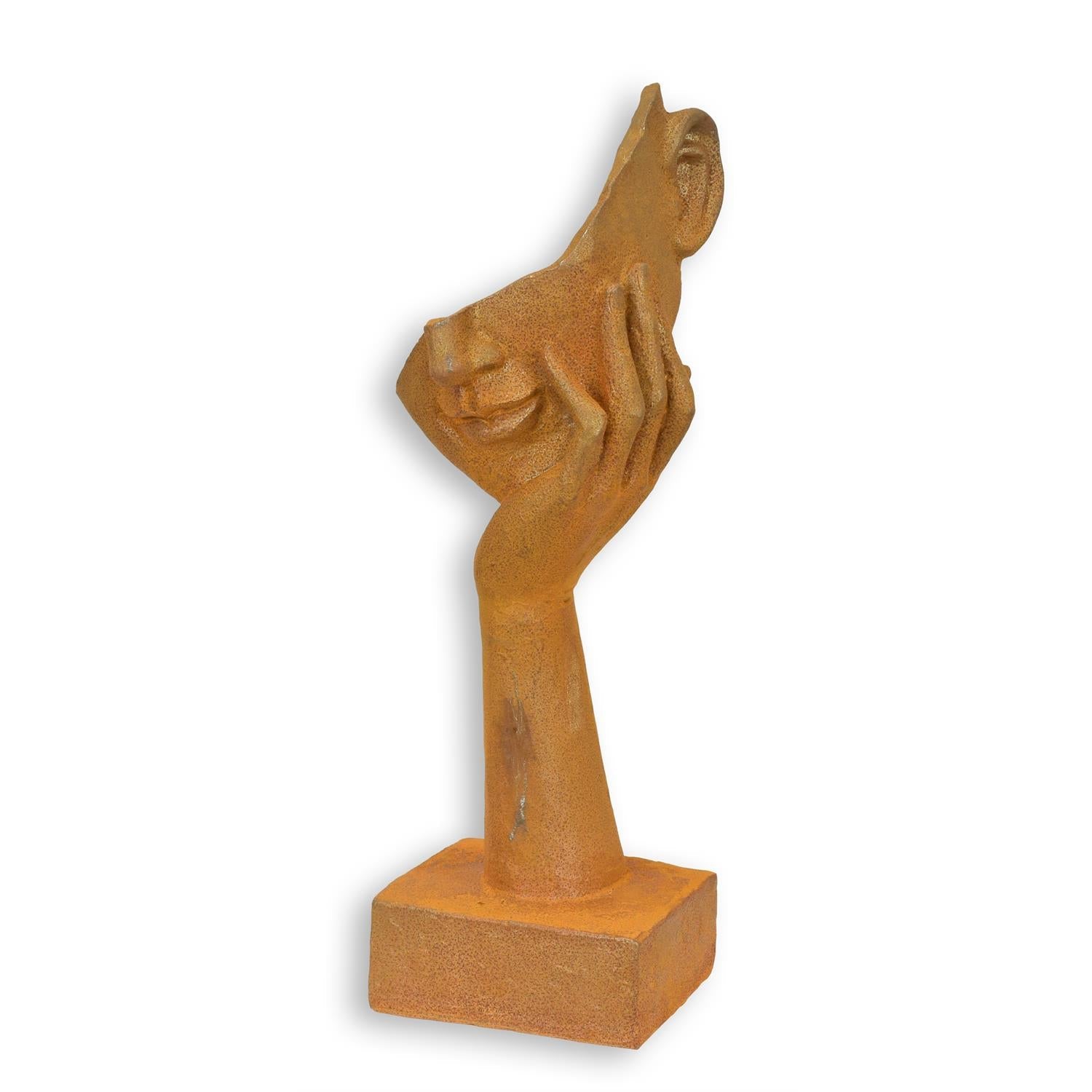 Rostige Gusseisenfigur eines Gesichts auf der Hand